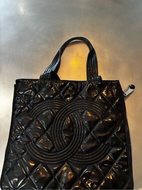 CHANEL Black Quilted Patent Tote with Logo Motif